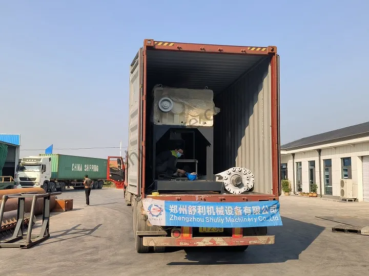 Double Shaft Shredder Being Loaded into Container